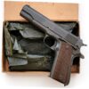 An exceptional documented WWII Ithaca Model 1911A1 Pistol US Navy Issue with its original issue box and packing paper.